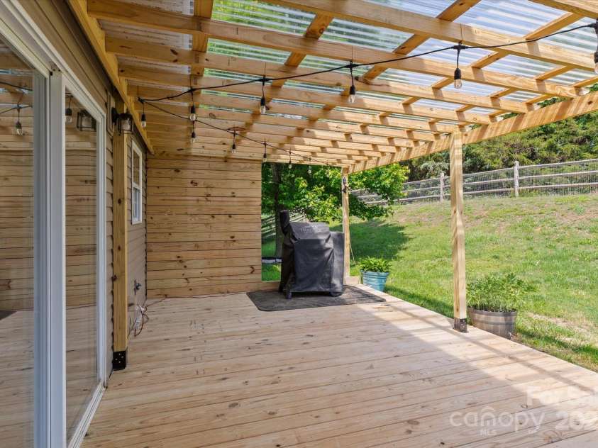 176 Pleasant Grove Lane, Mooresville, NC 28115.  MLS# CAR4259167, YatesRealty ID 19306. Back Deck