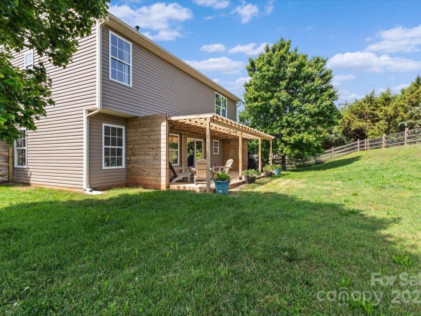176 Pleasant Grove Lane, Mooresville, NC 28115.  MLS# CAR4259167, YatesRealty ID 19306. Backyard