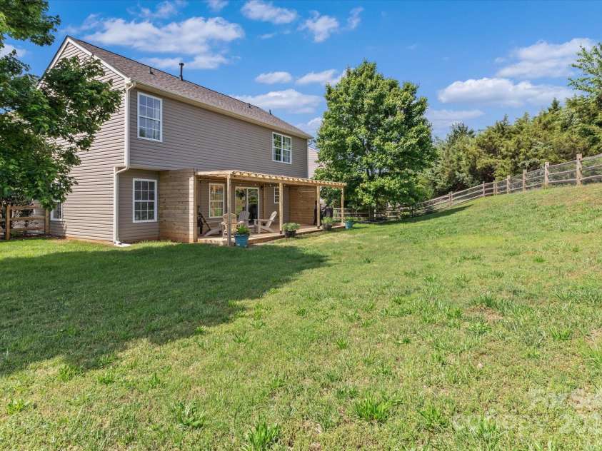 176 Pleasant Grove Lane, Mooresville, NC 28115.  MLS# CAR4259167, YatesRealty ID 19306. Backyard