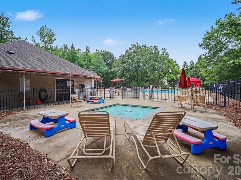 8500 Woodhill Manor Court, Charlotte, NC 28215.  MLS# CAR4417739, YatesRealty ID 19307. Community Pool