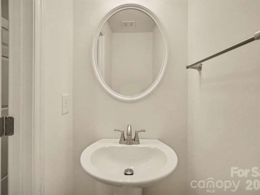 8500 Woodhill Manor Court, Charlotte, NC 28215.  MLS# CAR4417739, YatesRealty ID 19307. Main level half bath