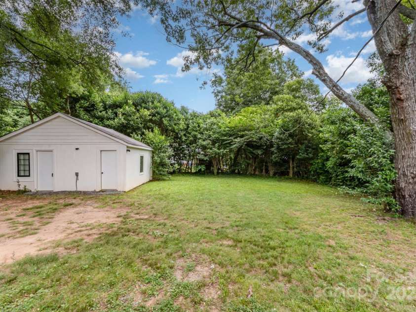 2601 Ashley Road, Charlotte, NC 28208.  MLS# CAR4260885, YatesRealty ID 19308. 2-bay wired workshop/storage outbuilding