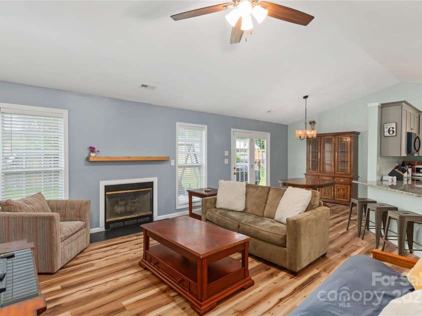 152 Sunberry Trail, Fletcher, NC 28732.  MLS# CAR4255053, YatesRealty ID 19309. Living Room to Dining Area