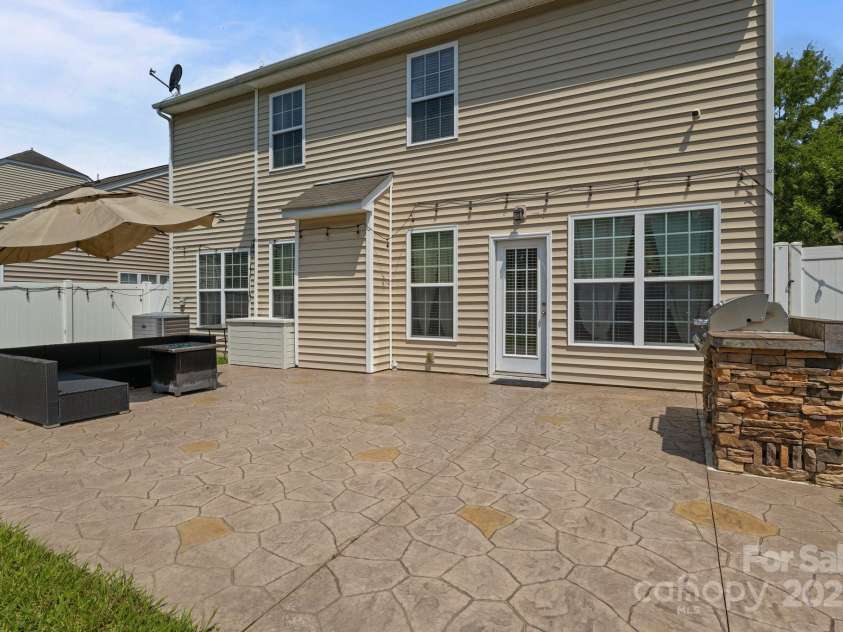 2233 Sonoma Valley Drive, Charlotte, NC 28214.  MLS# CAR4265873, YatesRealty ID 19310. Backyard facing the house