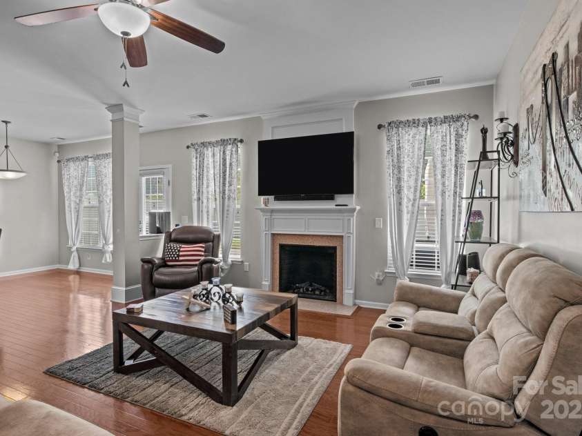 2233 Sonoma Valley Drive, Charlotte, NC 28214.  MLS# CAR4265873, YatesRealty ID 19310. Front room with fireplace from garage