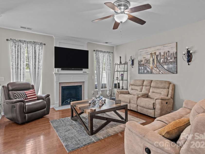 2233 Sonoma Valley Drive, Charlotte, NC 28214.  MLS# CAR4265873, YatesRealty ID 19310. Front room with fireplace from kitchen