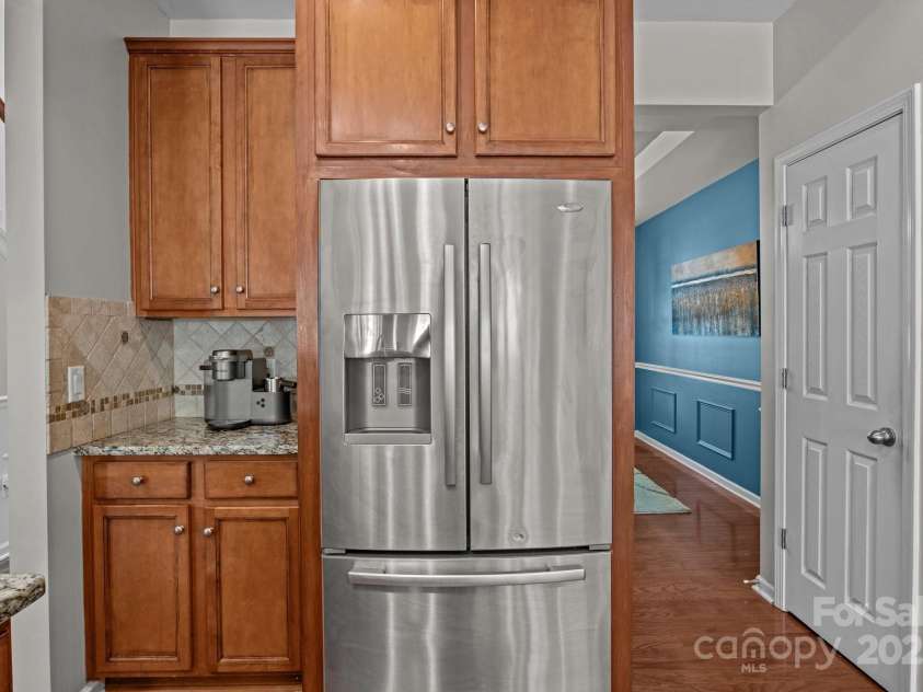 2233 Sonoma Valley Drive, Charlotte, NC 28214.  MLS# CAR4265873, YatesRealty ID 19310. Kitchen refrigerator tight