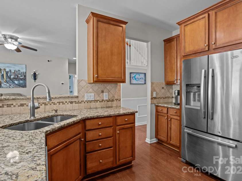 2233 Sonoma Valley Drive, Charlotte, NC 28214.  MLS# CAR4265873, YatesRealty ID 19310. Kitchen sink and refrigerator tight
