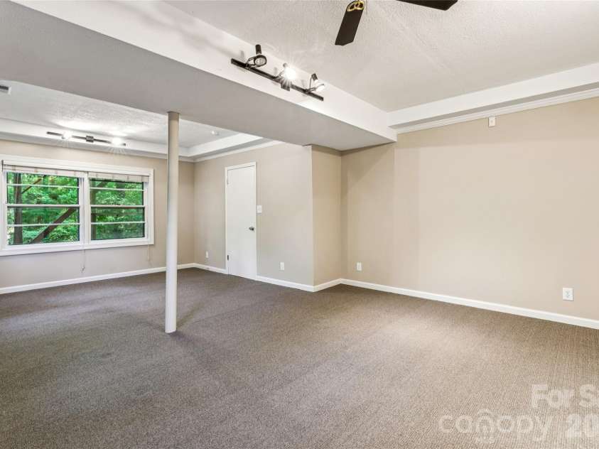 2227 Wensley Drive, Charlotte, NC 28210.  MLS# CAR4376969, YatesRealty ID 19311. Finished Basement