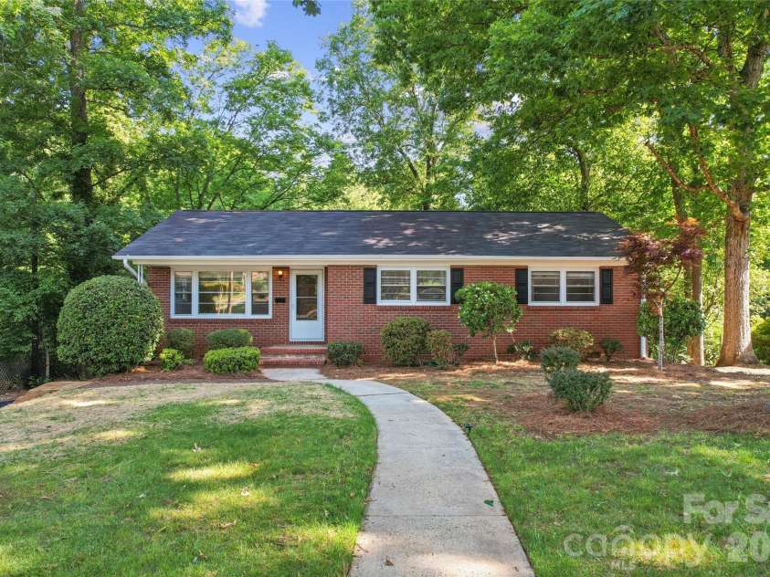 2227 Wensley Drive, Charlotte, NC 28210.  MLS# CAR4376969, YatesRealty ID 19311. Set back from road for enhanced privacy and a great front yard!