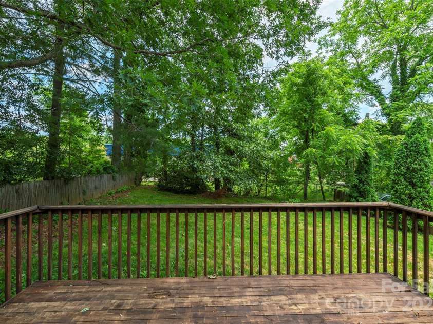 49 Jeffress Avenue, Asheville, NC 28803.  MLS# CAR4258429, YatesRealty ID 19316. Back deck large back yard