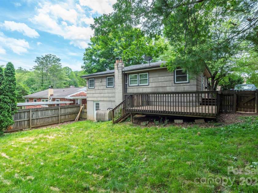 49 Jeffress Avenue, Asheville, NC 28803.  MLS# CAR4258429, YatesRealty ID 19316. Relax and enjoy a huge back yard