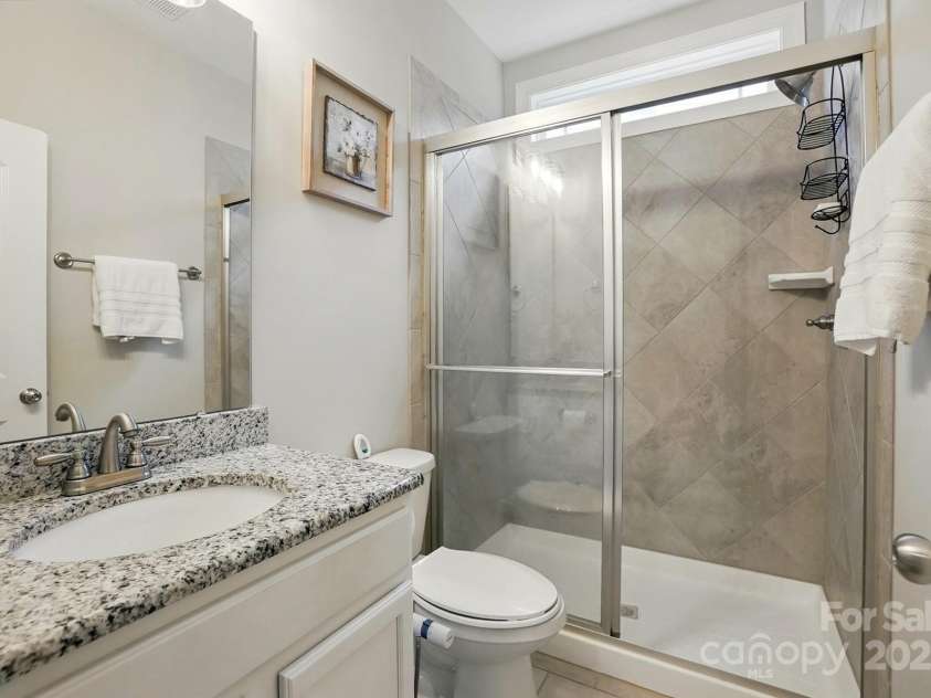9511 Spurwig Court, Charlotte, NC 28278.  MLS# CAR4265487, YatesRealty ID 19317. Guest Bathroom
