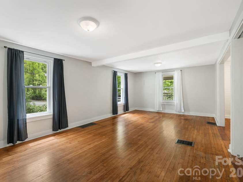 47 Saw Branch Road, Candler, NC 28715.  MLS# CAR4354306, YatesRealty ID 19330. Large Living Room 