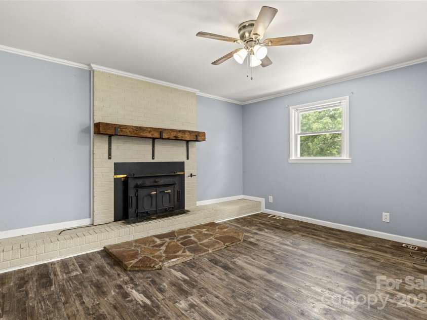 2476 Cane Mill Road, Lancaster, SC 29720.  MLS# CAR4270126, YatesRealty ID 19332. Livingroom fireplace
