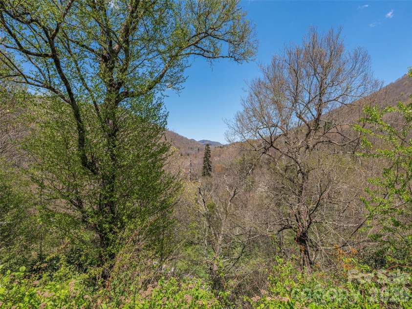 240 Plott Balsam Road, Maggie Valley, NC 28751.  MLS# CAR4374261, YatesRealty ID 19334. Distant mtn views
