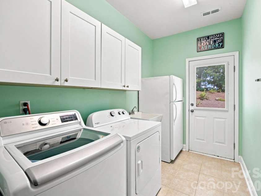 7223 Old Valley Way, Harrisburg, NC 28075.  MLS# CAR4378364, YatesRealty ID 19342. Laundry room main floor with access to outside
