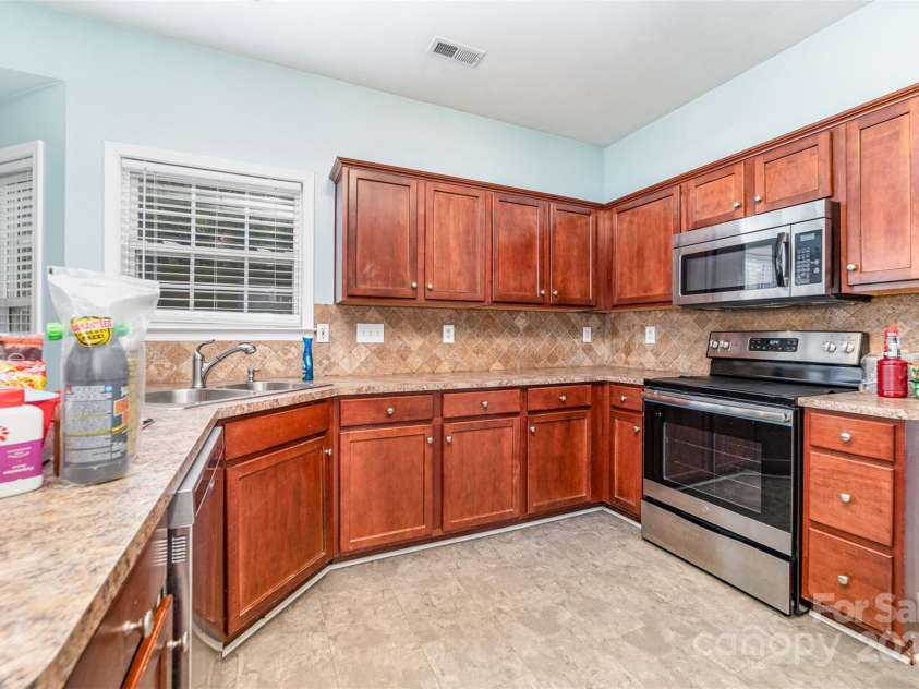 98 Poplar Woods Drive, Concord, NC 28027.  MLS# CAR4280697, YatesRealty ID 1935. 