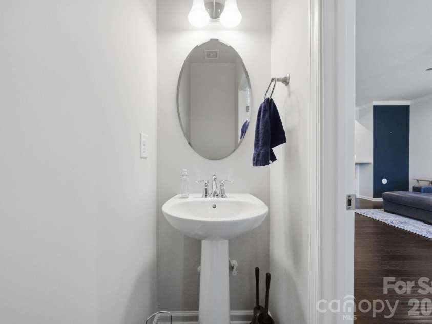 1221 Queen Lyon Court, Charlotte, NC 28205.  MLS# CAR4375397, YatesRealty ID 19353. Half bathroom on second level