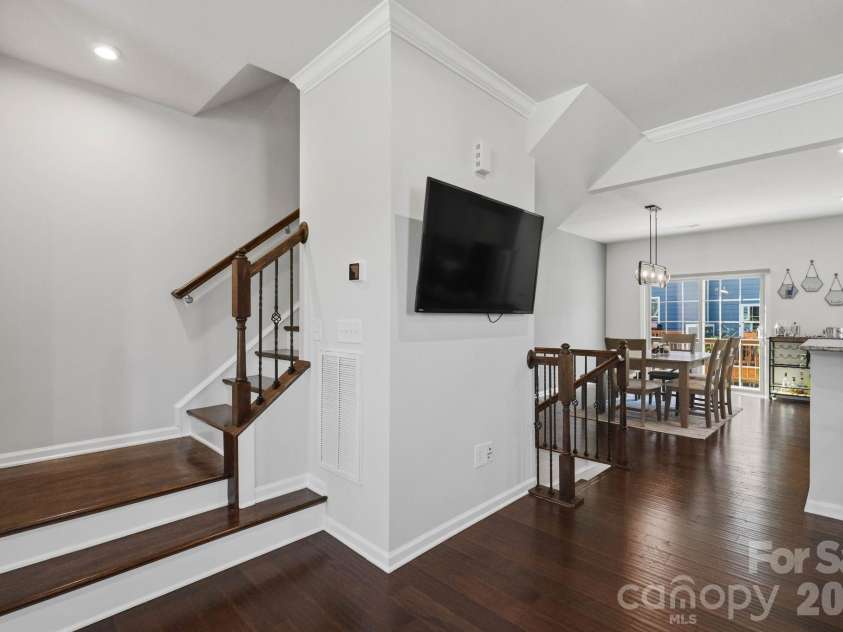 1221 Queen Lyon Court, Charlotte, NC 28205.  MLS# CAR4375397, YatesRealty ID 19353. Second level staircare