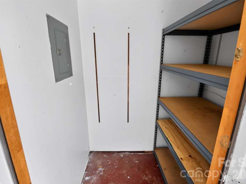 9234 Kings Canyon Drive, Charlotte, NC 28210.  MLS# CAR4374803, YatesRealty ID 19354. Storage room on back deck
