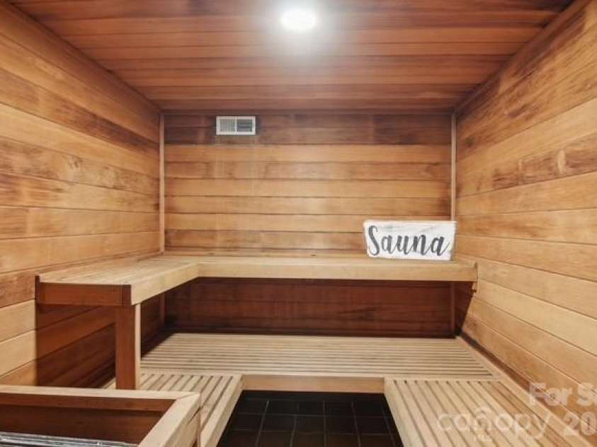 295 Dills Road, Bryson City, NC 28713.  MLS# CAR4373473, YatesRealty ID 19361. A relaxing sauna on the lower level