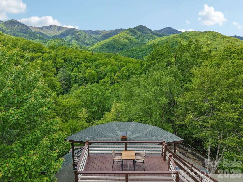 295 Dills Road, Bryson City, NC 28713.  MLS# CAR4373473, YatesRealty ID 19361. Incredible views from above the meticulously designed home