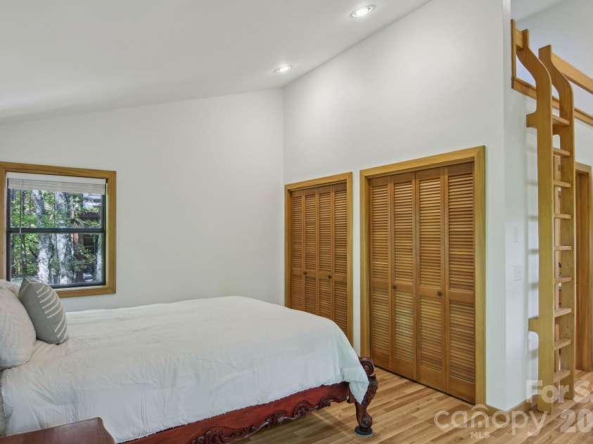 295 Dills Road, Bryson City, NC 28713.  MLS# CAR4373473, YatesRealty ID 19361. Primary suite with loft