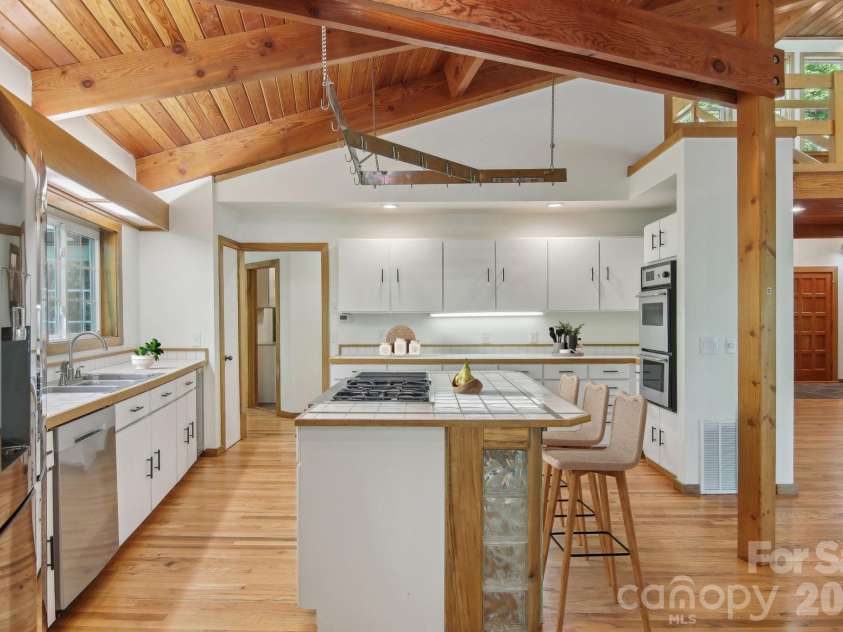 295 Dills Road, Bryson City, NC 28713.  MLS# CAR4373473, YatesRealty ID 19361. Spacious kitchen with large island and an abundance of storage