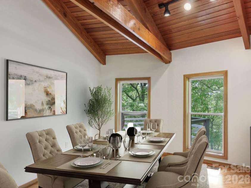 295 Dills Road, Bryson City, NC 28713.  MLS# CAR4373473, YatesRealty ID 19361. The dining area filled with space and natural light