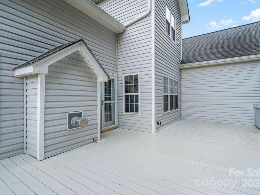 3905 Farlow Road, Charlotte, NC 28269.  MLS# CAR4238350, YatesRealty ID 19361. Extended Deck -compsite wood