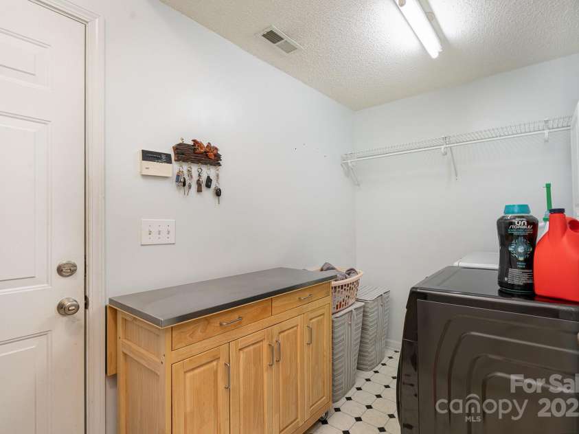 3905 Farlow Road, Charlotte, NC 28269.  MLS# CAR4238350, YatesRealty ID 19361. Laundry Room-downstairs