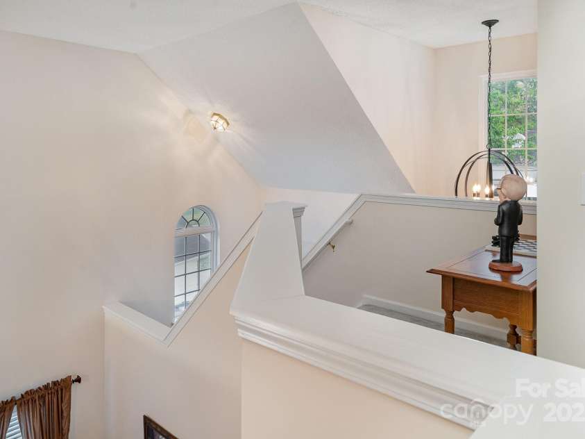 3905 Farlow Road, Charlotte, NC 28269.  MLS# CAR4238350, YatesRealty ID 19361. Upstairs Hall-overlooks family room