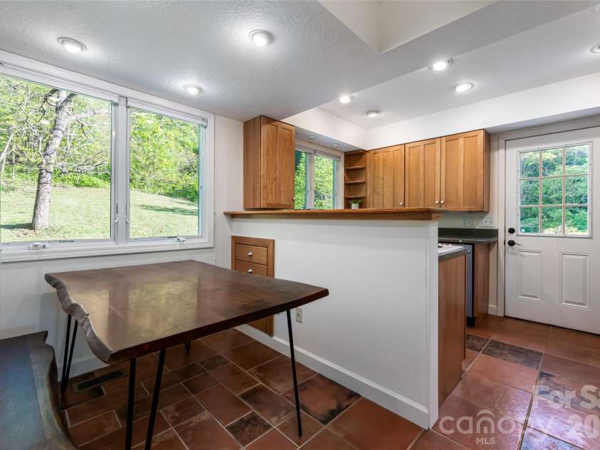 10 and 12 Dogwood Hills Lane, Weaverville, NC 28787.  MLS# CAR4374354, YatesRealty ID 19362. Guest House Dining + Kitchen