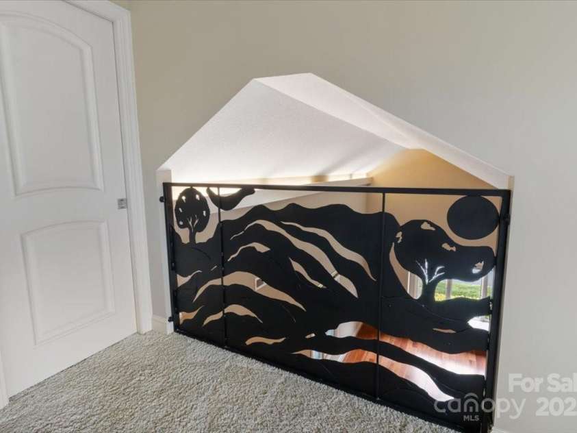 452 Kyfields None, Weaverville, NC 28787.  MLS# CAR4255494, YatesRealty ID 19368. Custom Iron Artwork overlooking downstairs
