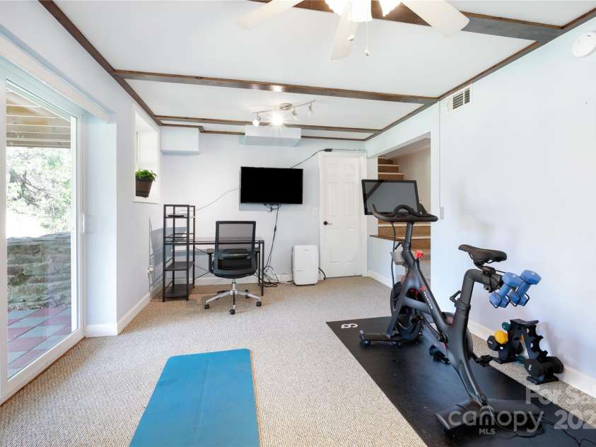 492 Paint Fork Road, Barnardsville, NC 28709.  MLS# CAR4239346, YatesRealty ID 19369. Lower Level Room