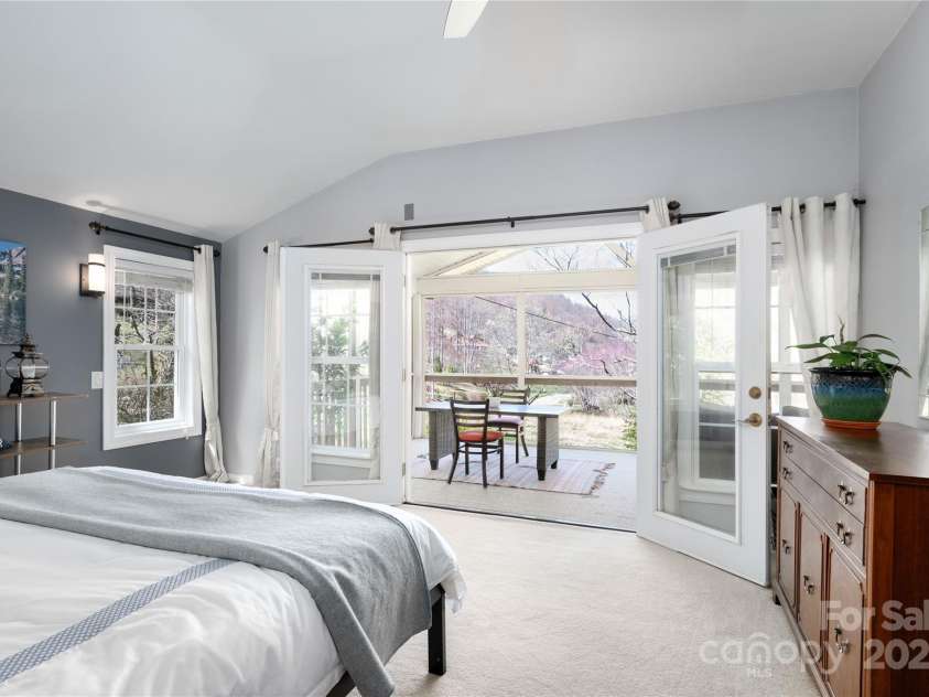 492 Paint Fork Road, Barnardsville, NC 28709.  MLS# CAR4239346, YatesRealty ID 19369. Master Bedroom w/Private Terrace