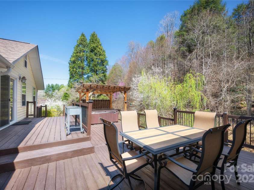 492 Paint Fork Road, Barnardsville, NC 28709.  MLS# CAR4239346, YatesRealty ID 19369. Rear Deck w/Hot Tub