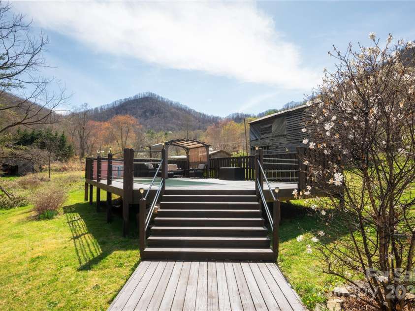 492 Paint Fork Road, Barnardsville, NC 28709.  MLS# CAR4239346, YatesRealty ID 19369. Walkway from house to Pool Deck
