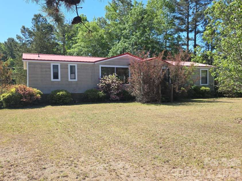 32331 Hwy 9 Highway, Pageland, SC 29728.  MLS# CAR4371079, YatesRealty ID 19377. Front view from Hwy 9