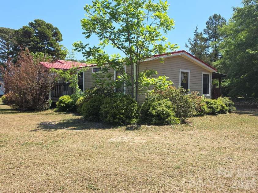32331 Hwy 9 Highway, Pageland, SC 29728.  MLS# CAR4371079, YatesRealty ID 19377. Front/side view