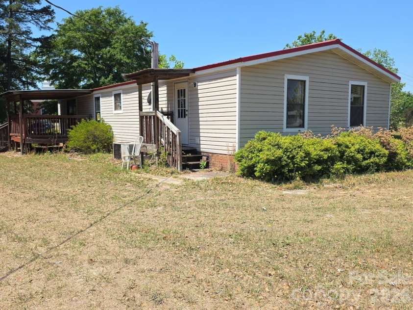 32331 Hwy 9 Highway, Pageland, SC 29728.  MLS# CAR4371079, YatesRealty ID 19377. Side/rear view