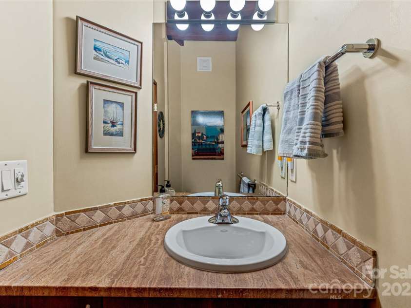 705 Overlook Drive, Flat Rock, NC 28731.  MLS# CAR4238498, YatesRealty ID 19377. 