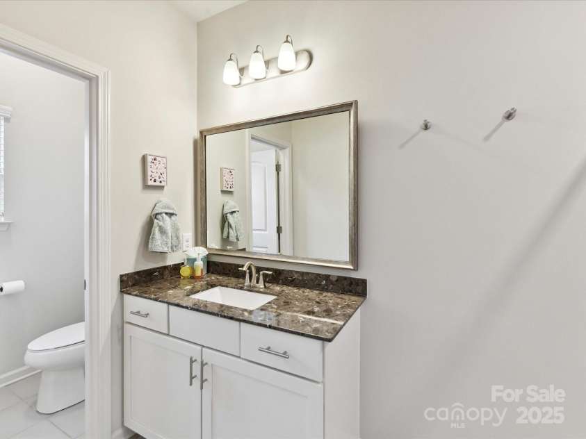 1132 Whitby Moore Street, Charlotte, NC 28273.  MLS# CAR4268789, YatesRealty ID 19378. Second Bedroom Ensuite Bath view 1
