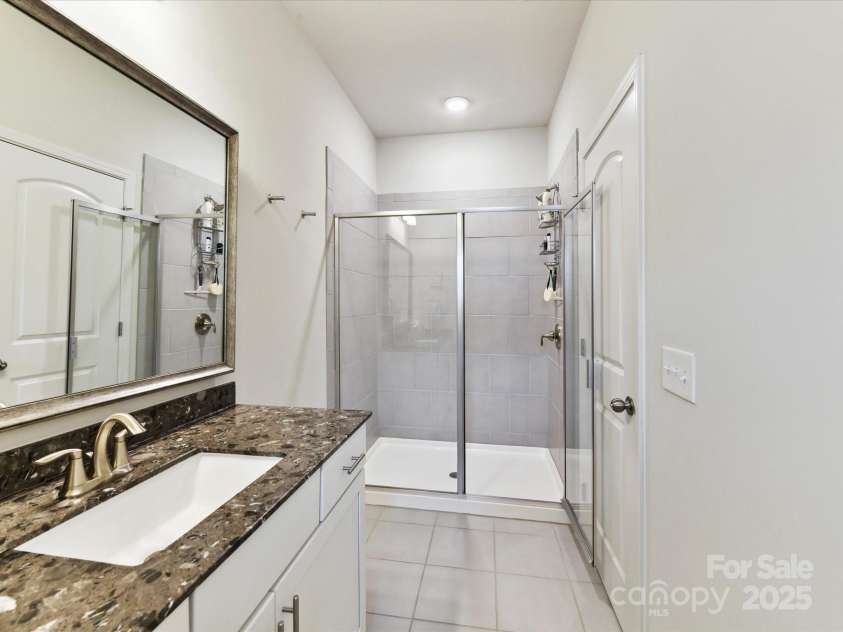 1132 Whitby Moore Street, Charlotte, NC 28273.  MLS# CAR4268789, YatesRealty ID 19378. Second Bedroom Ensuite Bath view 2