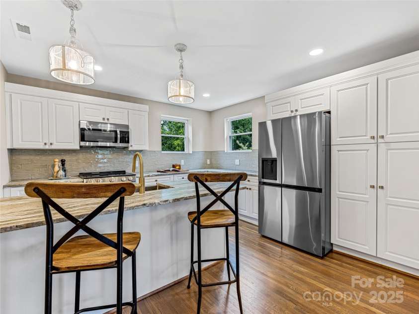 162 Courtland Place, Asheville, NC 28801.  MLS# CAR4261167, YatesRealty ID 19387. Lots of Storage in Kitchen