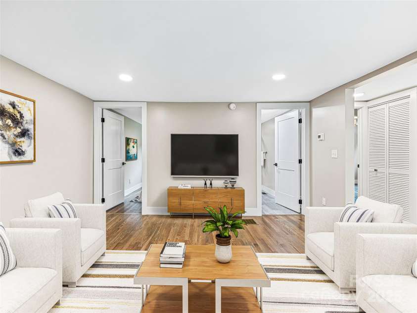 162 Courtland Place, Asheville, NC 28801.  MLS# CAR4261167, YatesRealty ID 19387. Lower Level living area