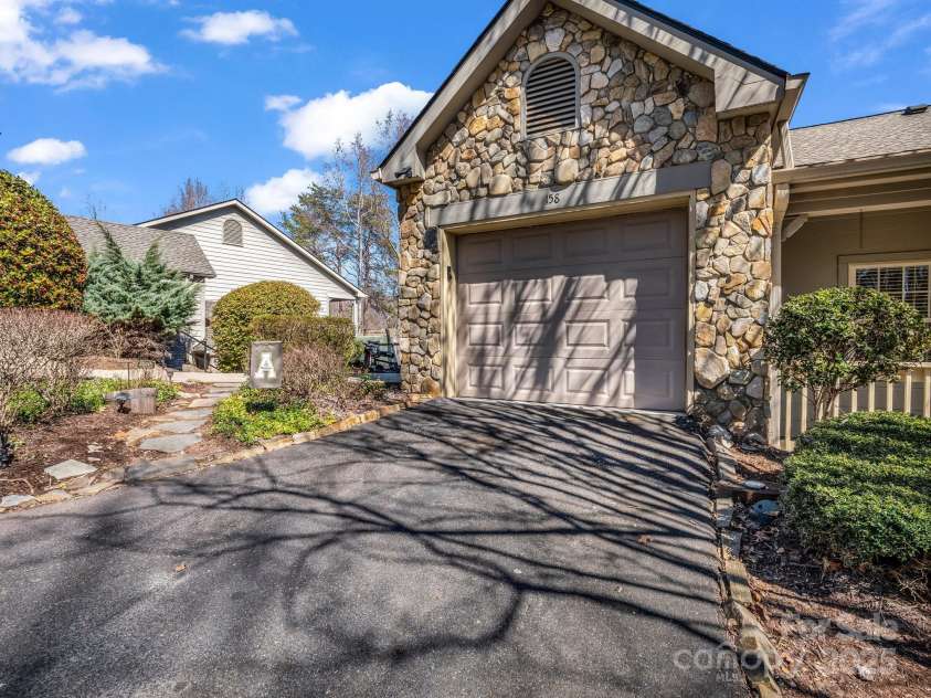 158 Stonecrest Court, Lake Lure, NC 28746.  MLS# CAR4230404, YatesRealty ID 19391. 1 car garage