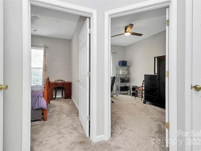 14451 San Paolo Lane, Charlotte, NC 28277.  MLS# CAR4270564, YatesRealty ID 19401. Hall leading to secondary bedrooms