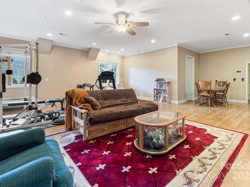 6 Grouse Terrace, Fairview, NC 28730.  MLS# CAR4269156, YatesRealty ID 19403. Basement family room or second living quarters